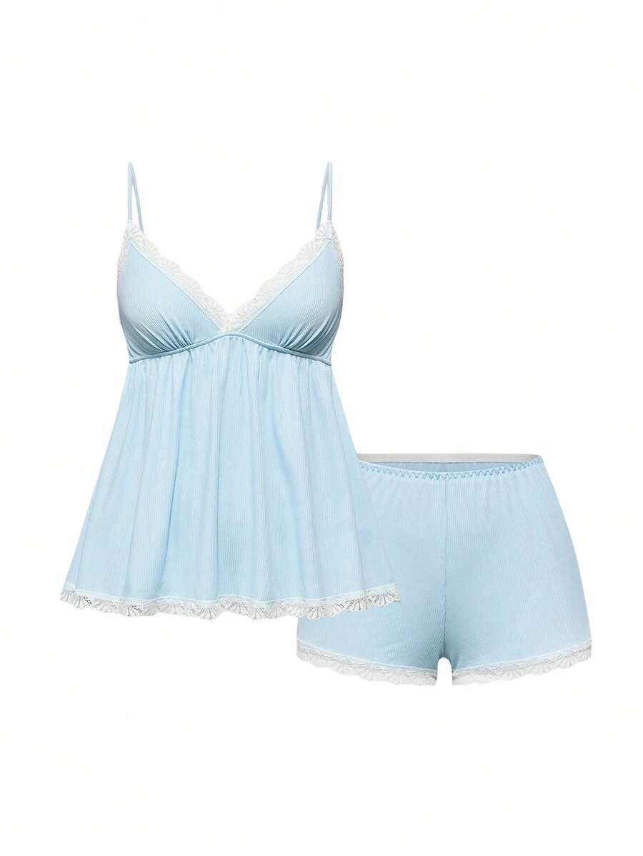 Ribbed lace camisole and shorts pajama set with spaghetti straps, bow detail, and contrast lace trim