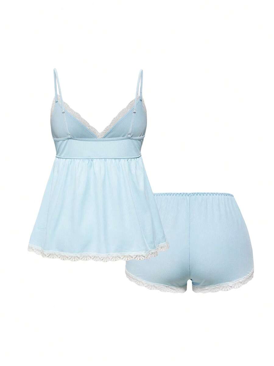 Ribbed lace camisole and shorts pajama set with spaghetti straps, bow detail, and contrast lace trim