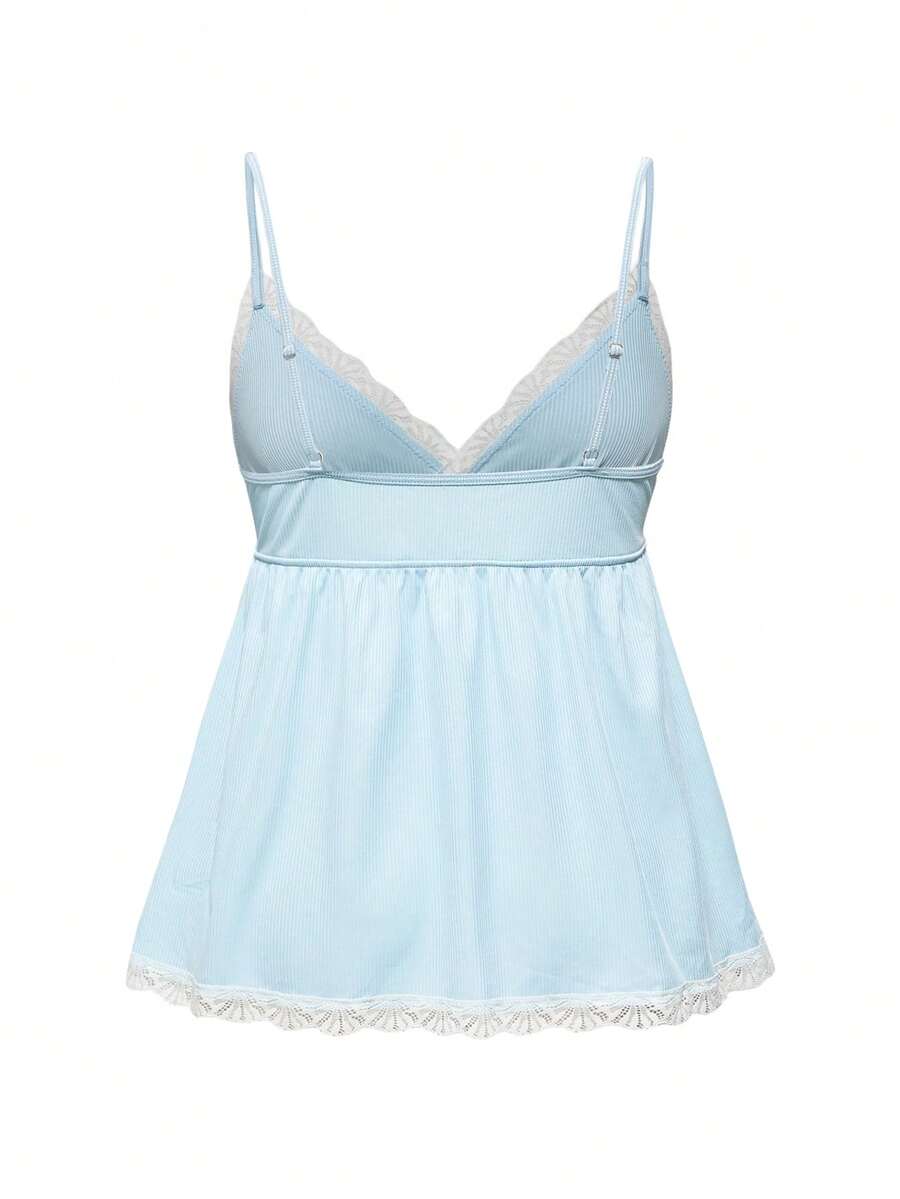 Ribbed lace camisole and shorts pajama set with spaghetti straps, bow detail, and contrast lace trim