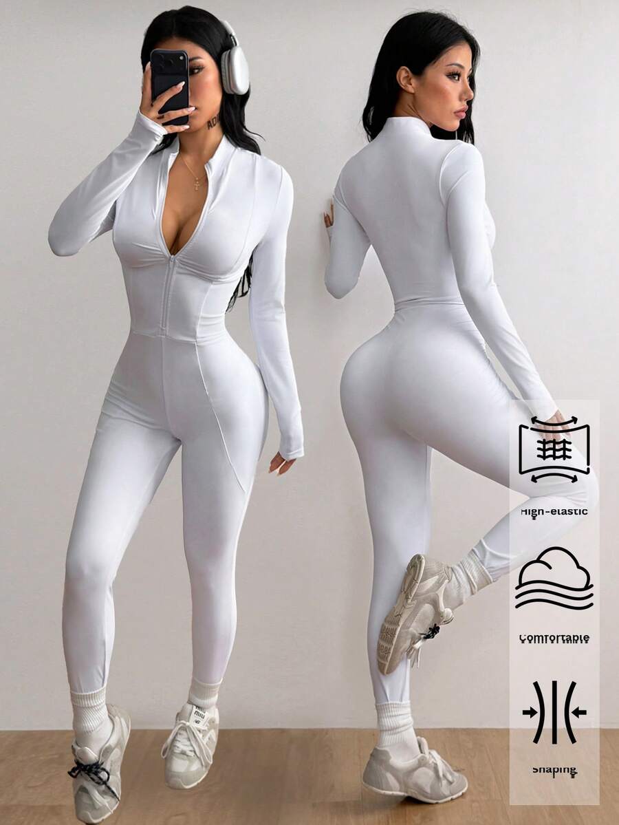 Fitted long sleeve unitard jumpsuit for women featuring a stand collar and front zipper closure in a solid color athletic style.
