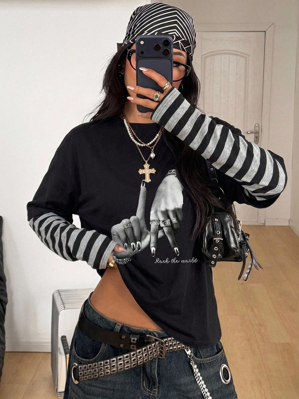 Women's casual 2-in-1 striped long sleeve graphic t-shirt featuring a round neckline, drop shoulders, rib-knit accents, and a loose fit.