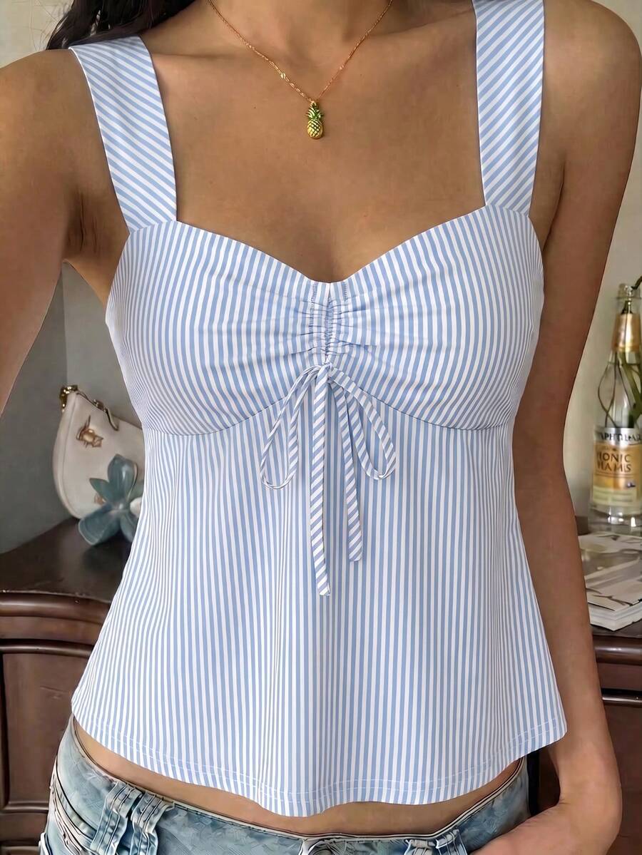 Women's striped camisole tank top with strap neckline, backless knot detail, cold shoulder styling, slim fit, and flared hem for casual vacation or daily wear.
