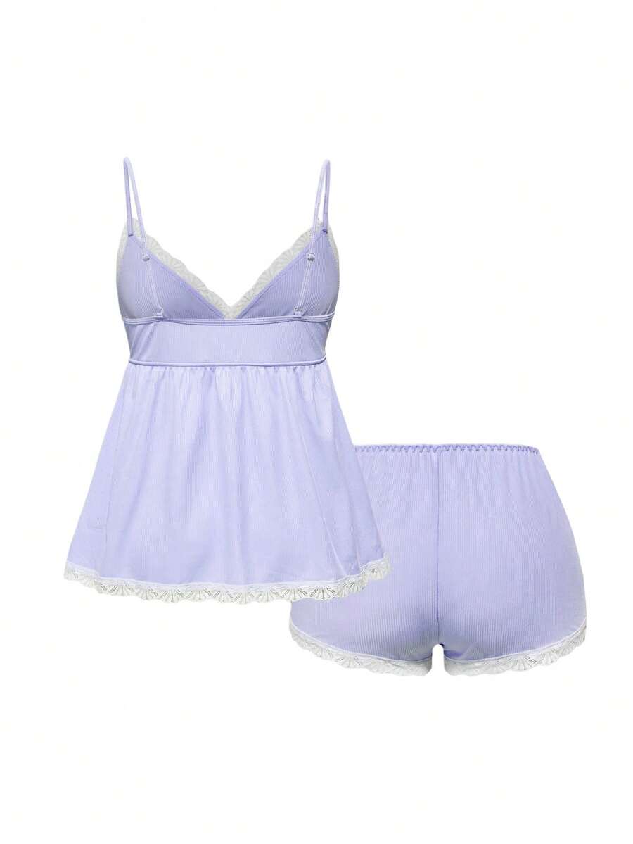 Ribbed lace camisole and shorts pajama set with spaghetti straps, bow detail, and contrast lace trim