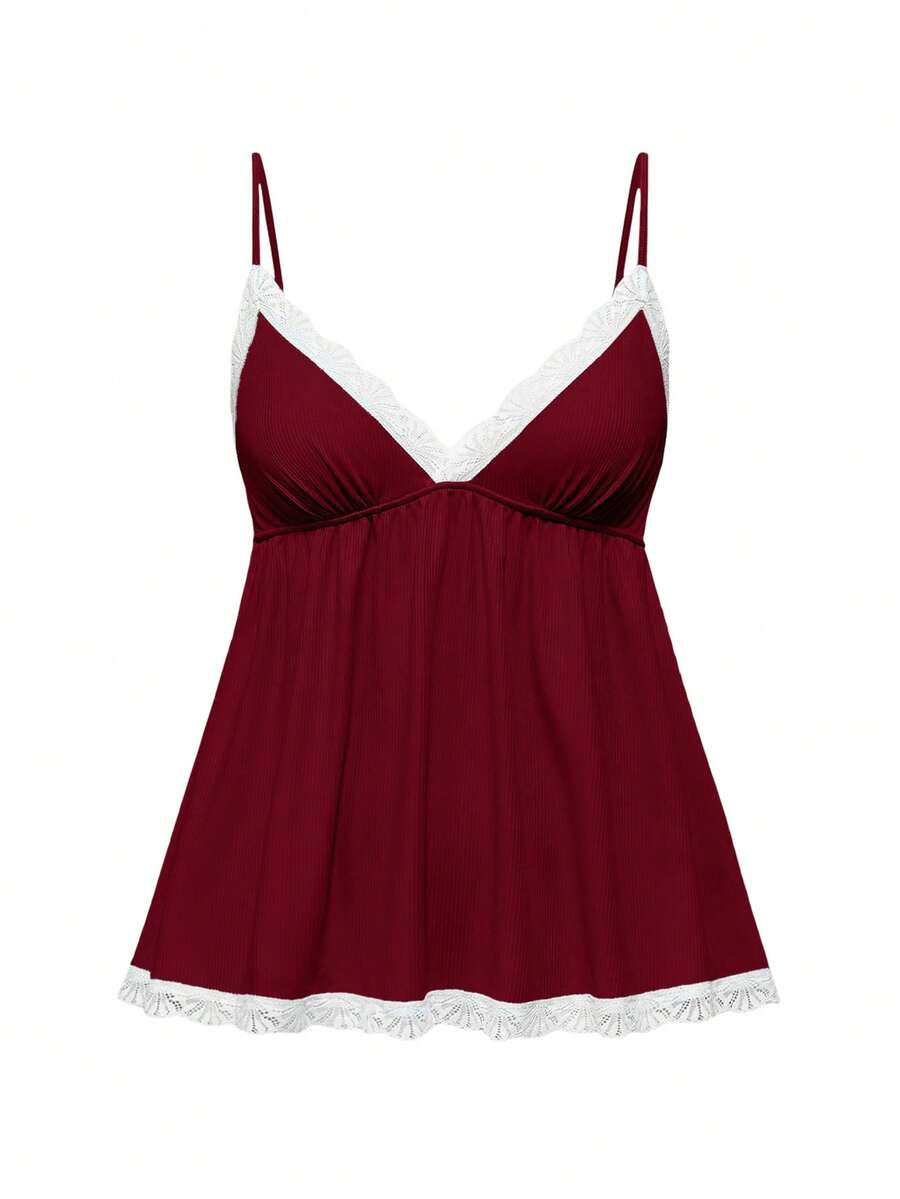 Ribbed lace camisole and shorts pajama set with spaghetti straps, bow detail, and contrast lace trim