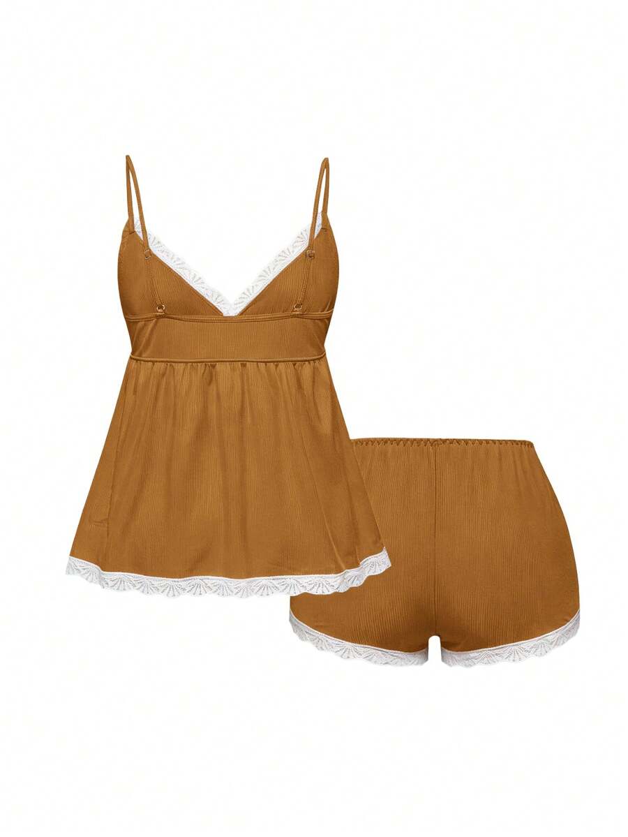 Ribbed lace camisole and shorts pajama set with spaghetti straps, bow detail, and contrast lace trim