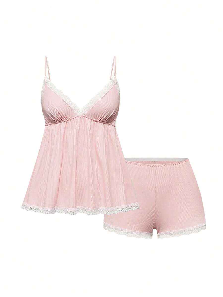 Ribbed lace camisole and shorts pajama set with spaghetti straps, bow detail, and contrast lace trim