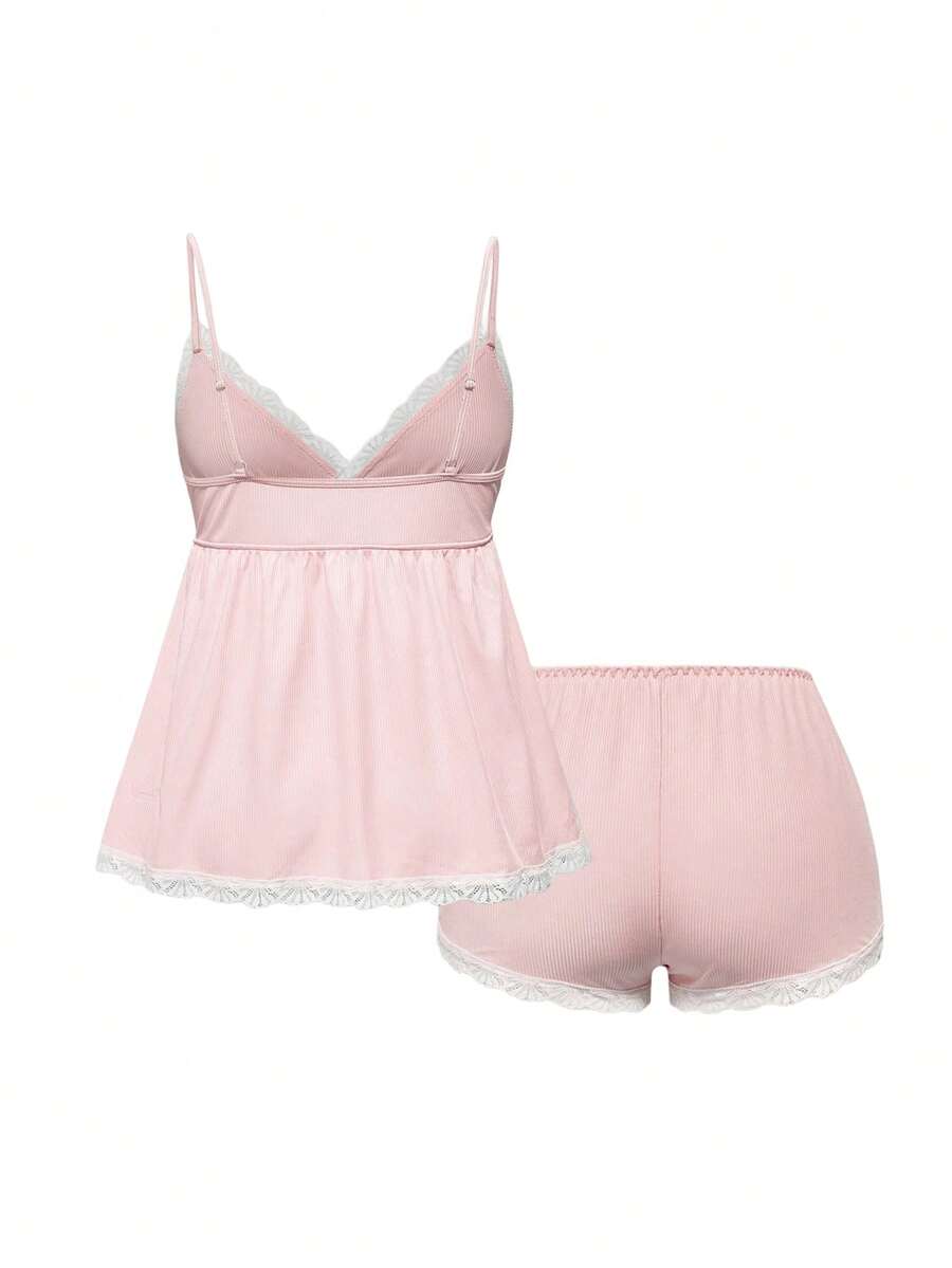 Ribbed lace camisole and shorts pajama set with spaghetti straps, bow detail, and contrast lace trim