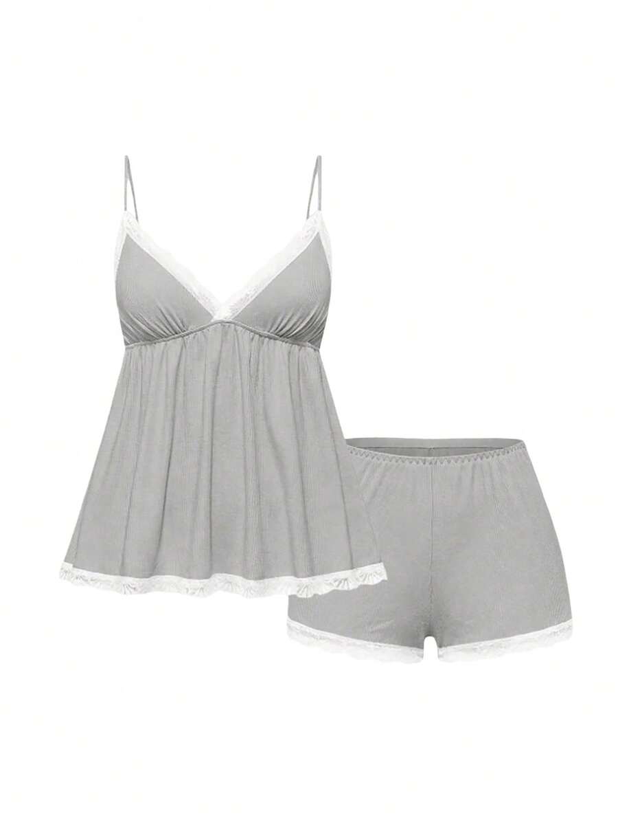 Ribbed lace camisole and shorts pajama set with spaghetti straps, bow detail, and contrast lace trim