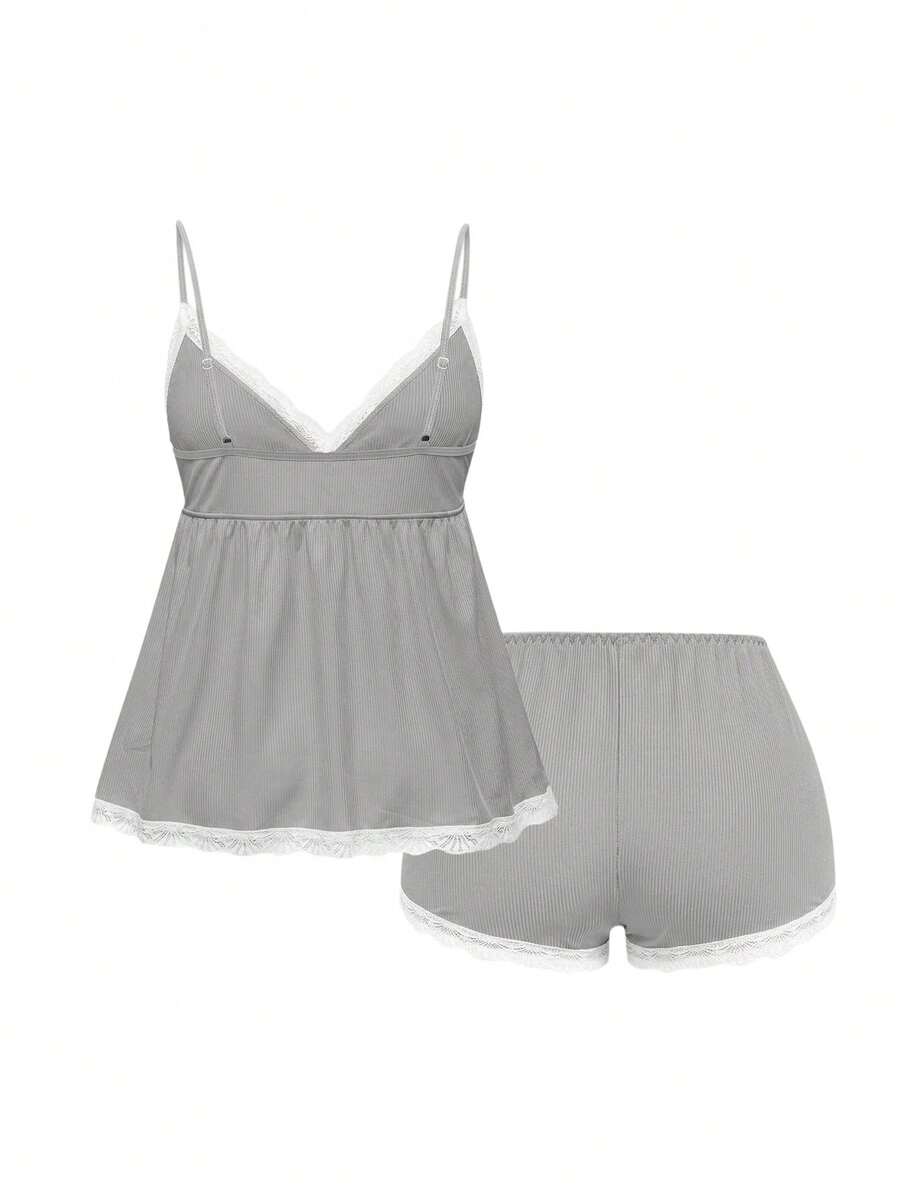 Ribbed lace camisole and shorts pajama set with spaghetti straps, bow detail, and contrast lace trim