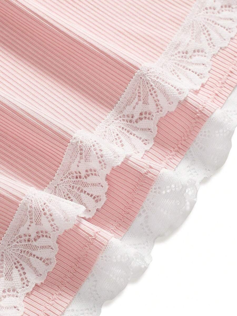 Ribbed lace camisole and shorts pajama set with spaghetti straps, bow detail, and contrast lace trim