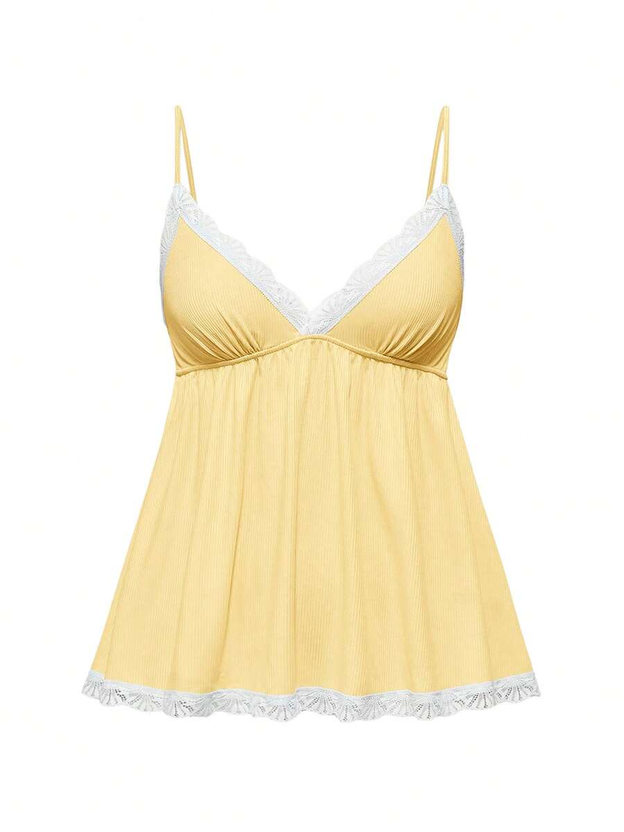 Ribbed lace camisole and shorts pajama set with spaghetti straps, bow detail, and contrast lace trim