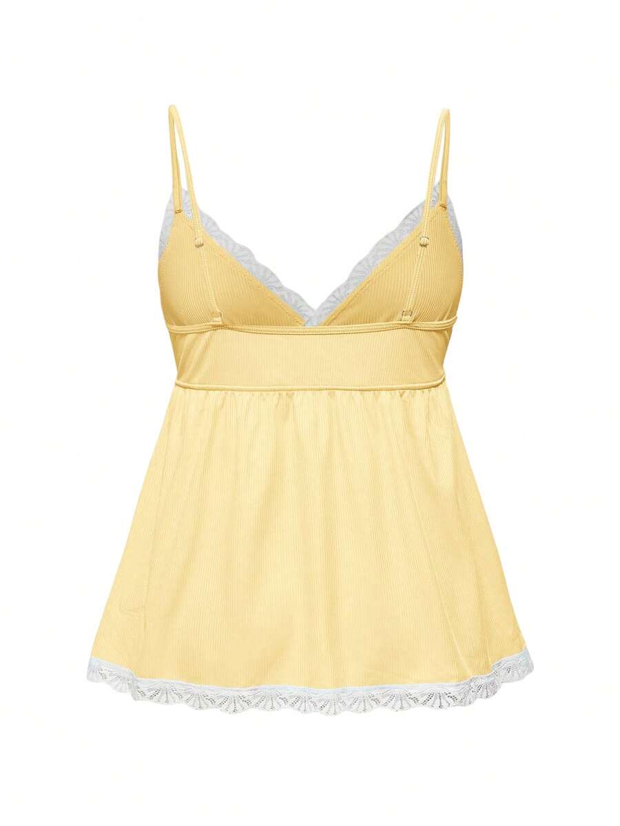 Ribbed lace camisole and shorts pajama set with spaghetti straps, bow detail, and contrast lace trim