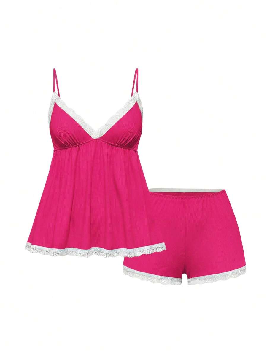 Ribbed lace camisole and shorts pajama set with spaghetti straps, bow detail, and contrast lace trim