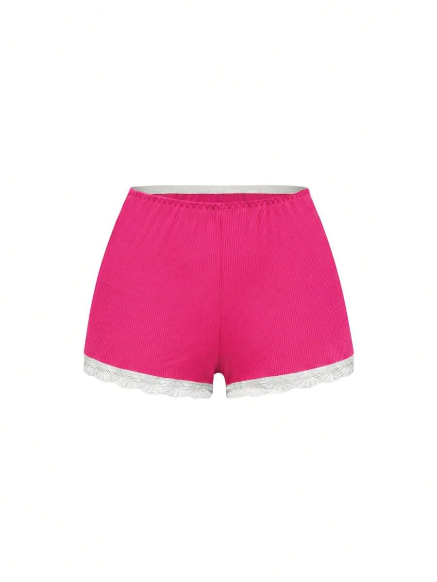 Ribbed lace camisole and shorts pajama set with spaghetti straps, bow detail, and contrast lace trim