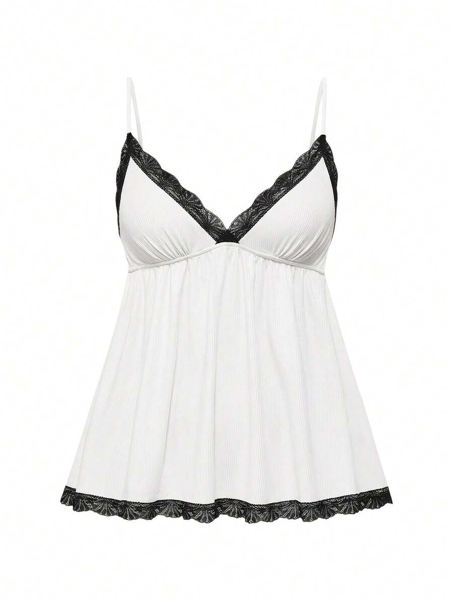 Ribbed lace camisole and shorts pajama set with spaghetti straps, bow detail, and contrast lace trim