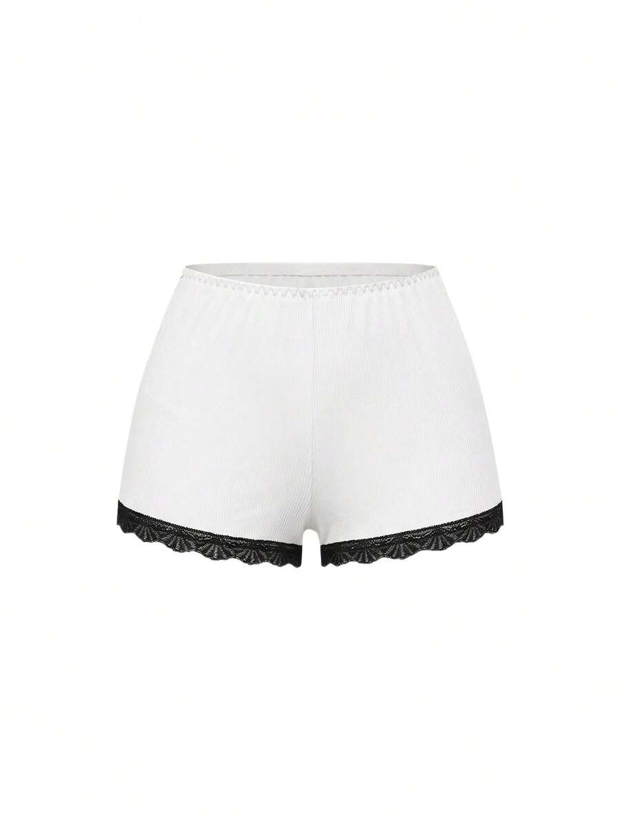 Ribbed lace camisole and shorts pajama set with spaghetti straps, bow detail, and contrast lace trim