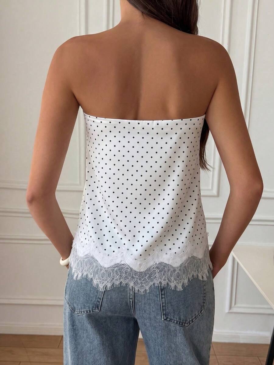 Strapless black and white bandeau top featuring a contrast lace patchwork flared hem and plant pattern.