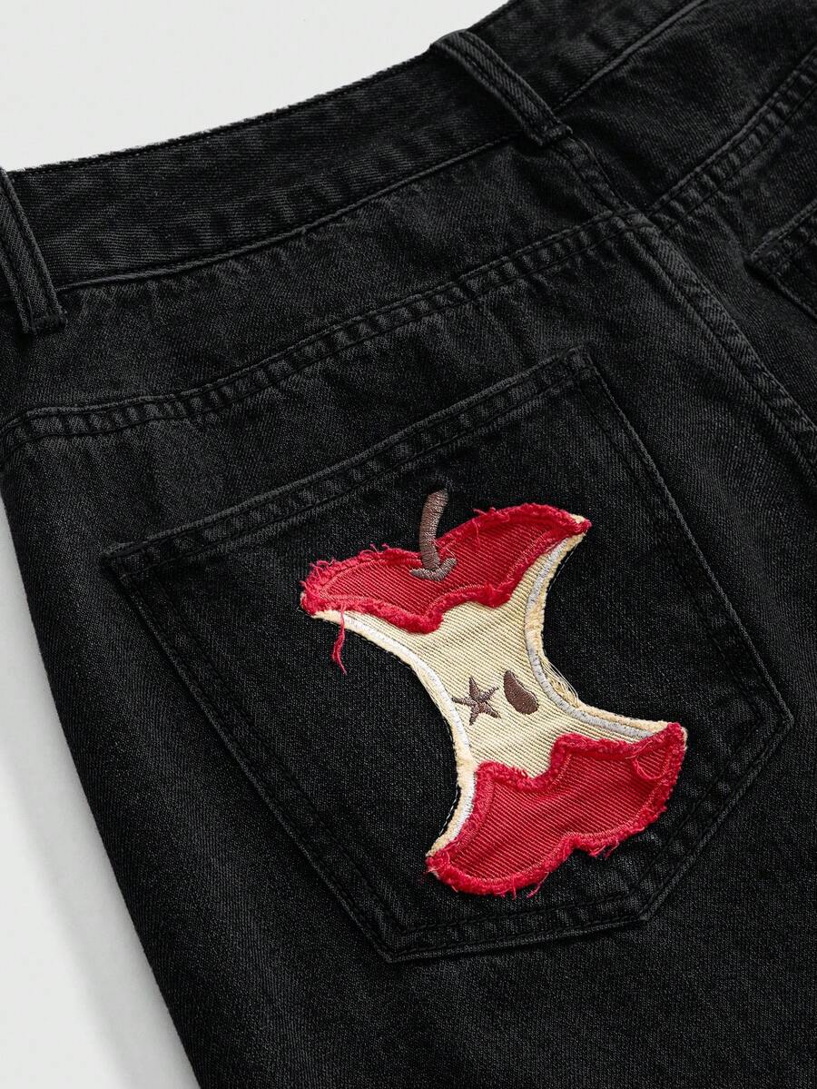 Women's loose baggy blue denim jeans featuring embroidered dragonfly and ladybug patch appliques, front pockets, and a straight-leg cut.