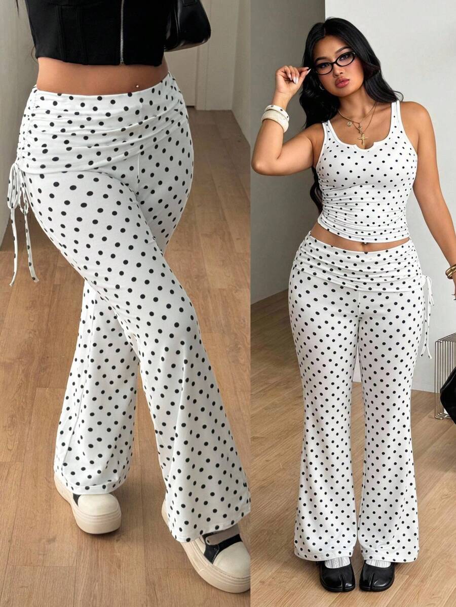 Women's striped flare leg pants featuring a mid-rise waist, slim fit thigh, and ruched side drawstring detail in stretch knit fabric.