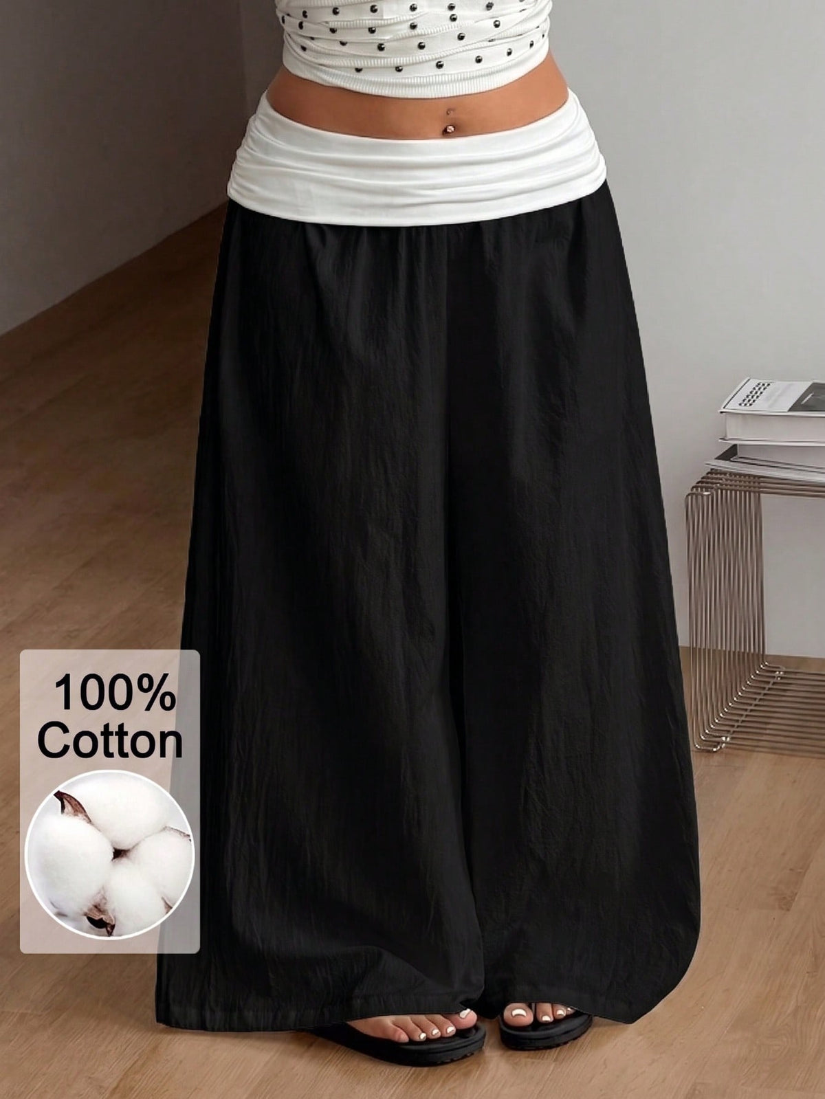 Women's plus size wide leg cotton pants featuring a relaxed loose fit and high waist design.