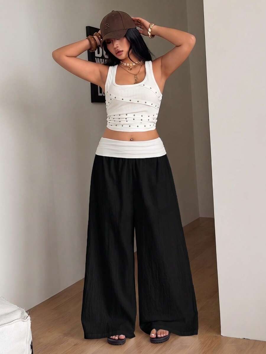 Women's plus size wide leg cotton pants featuring a relaxed loose fit and high waist design.