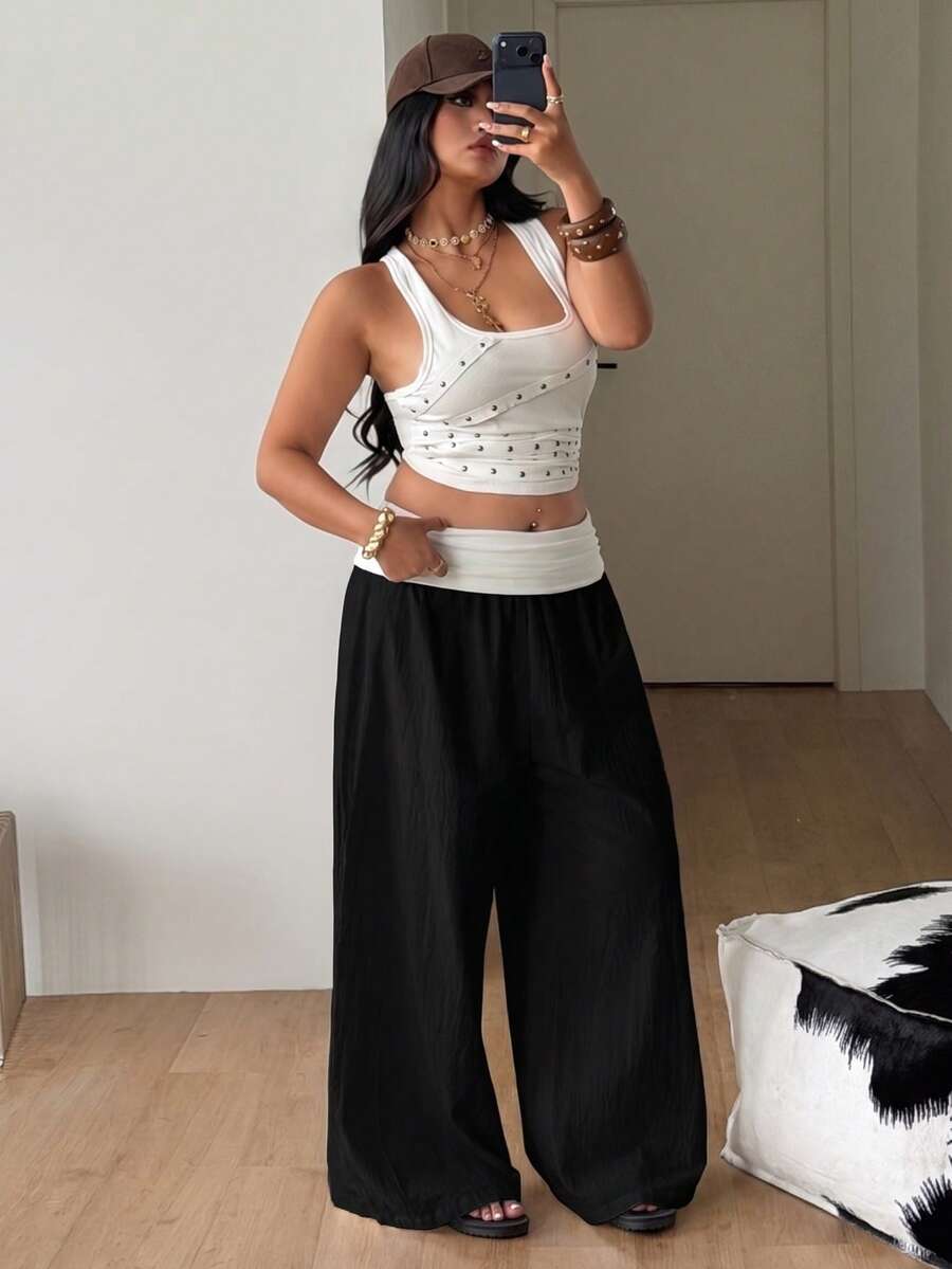 Women's plus size wide leg cotton pants featuring a relaxed loose fit and high waist design.