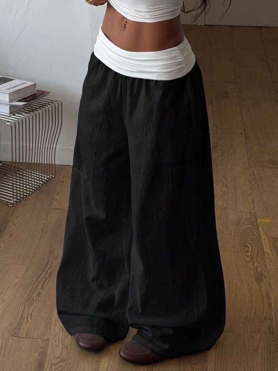 Women's plus size wide leg cotton pants featuring a relaxed loose fit and high waist design.
