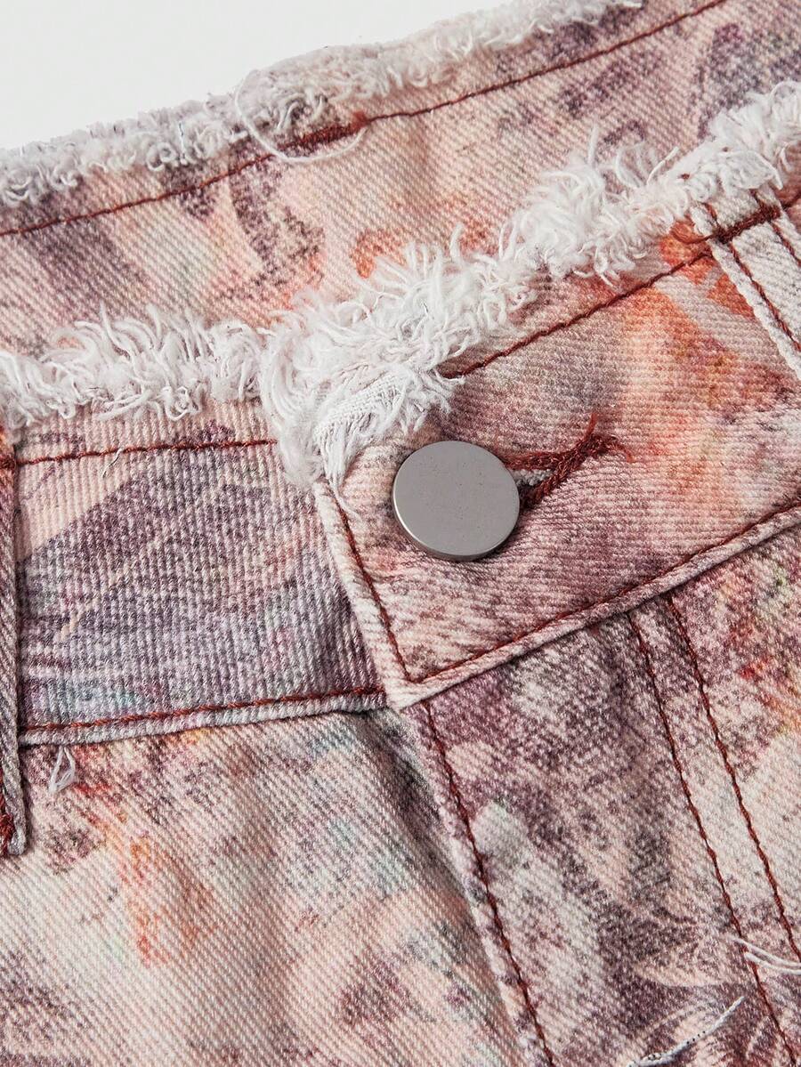 Brown paisley mini shorts with ultra low waist, raw frayed hem, pockets, and zipper detail