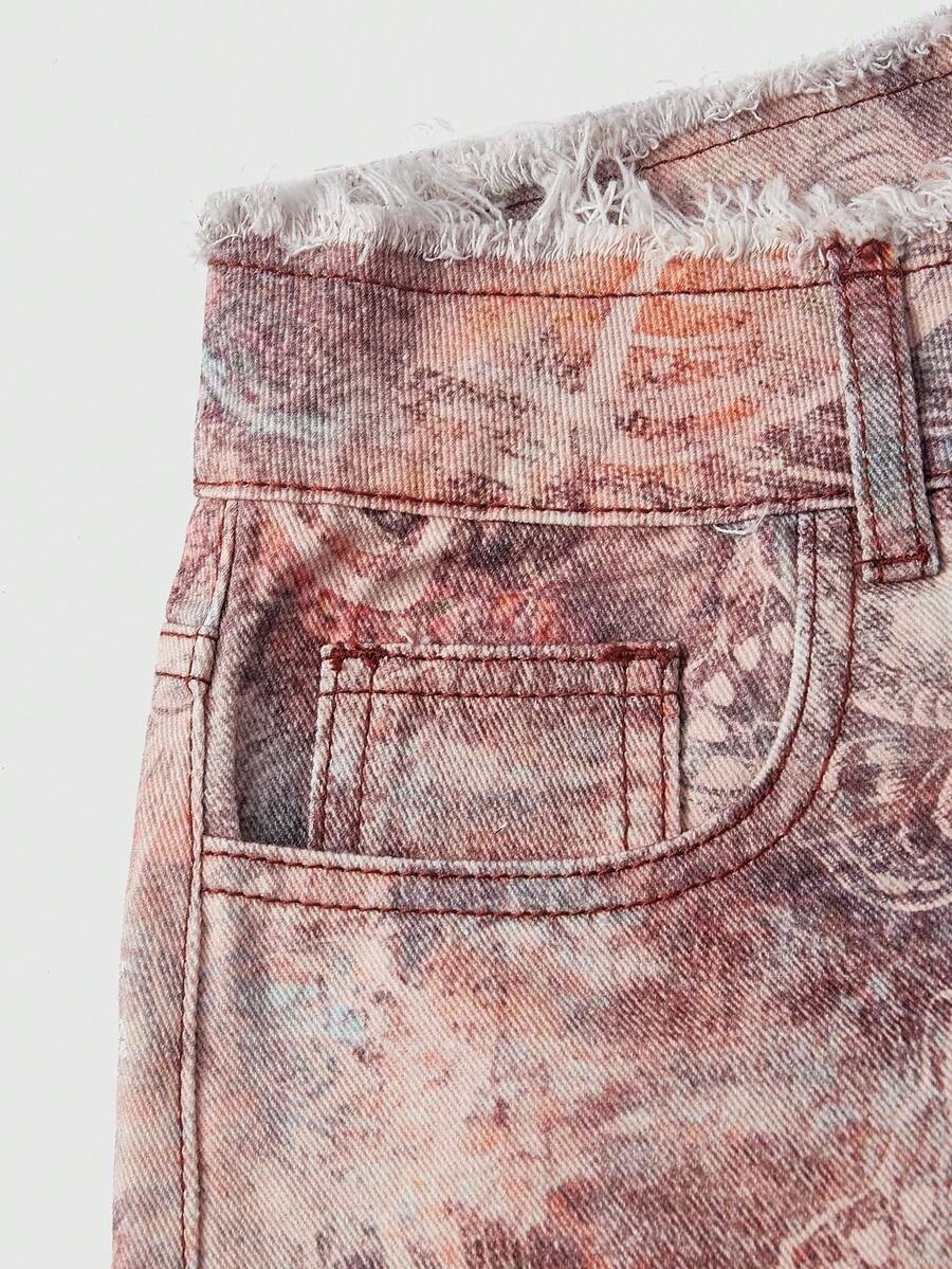 Brown paisley mini shorts with ultra low waist, raw frayed hem, pockets, and zipper detail