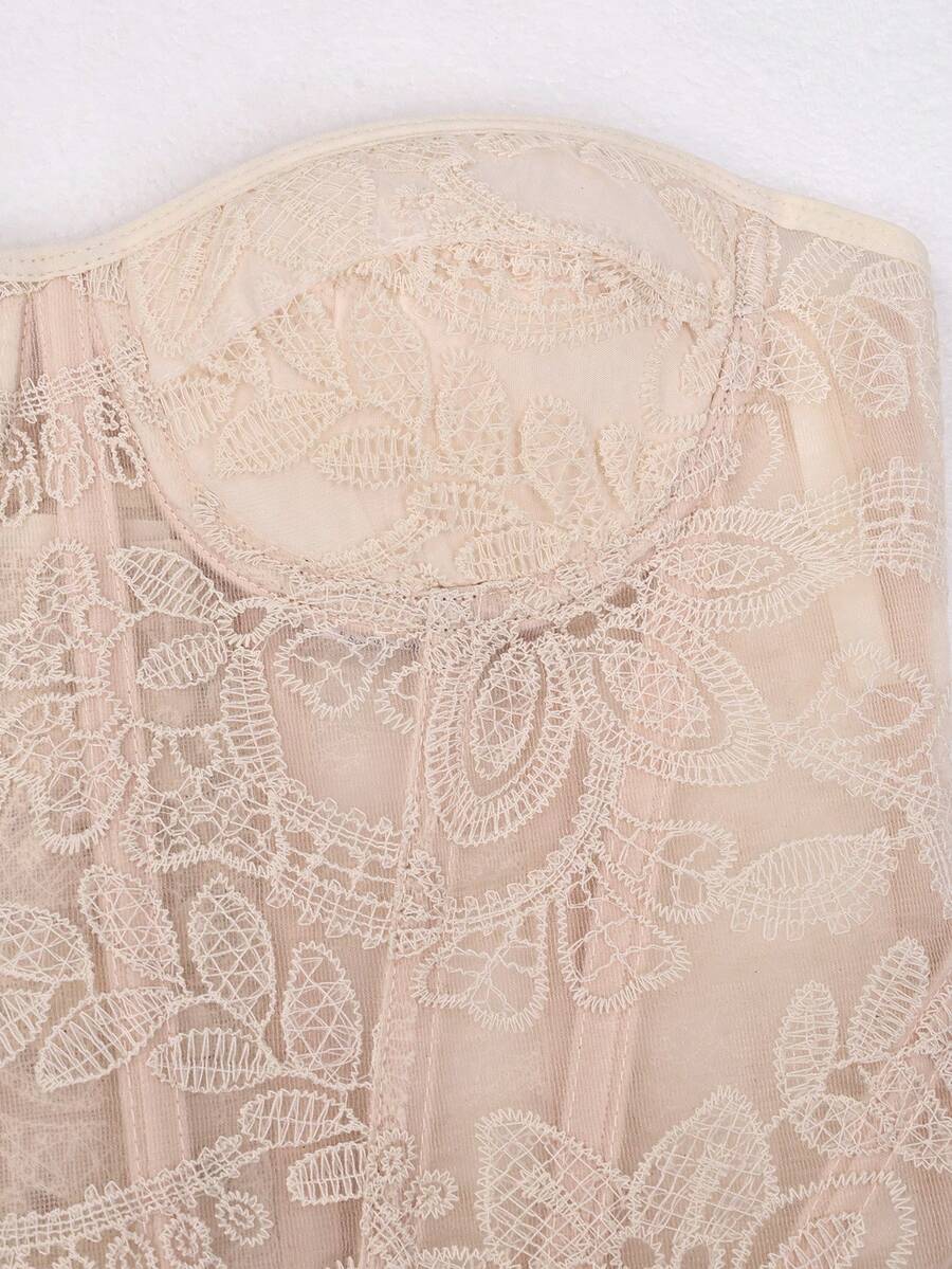 Women's strapless lace boned corset top featuring cup details, grommet eyelets, and a slim fit design.
