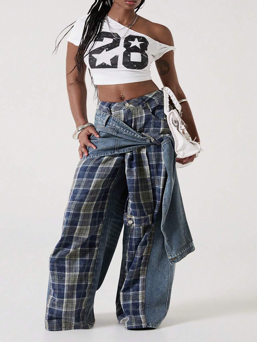 Women's plus size blue patchwork denim jeans featuring front lace-up detailing, mid waist, zipper fly, and functional pockets.