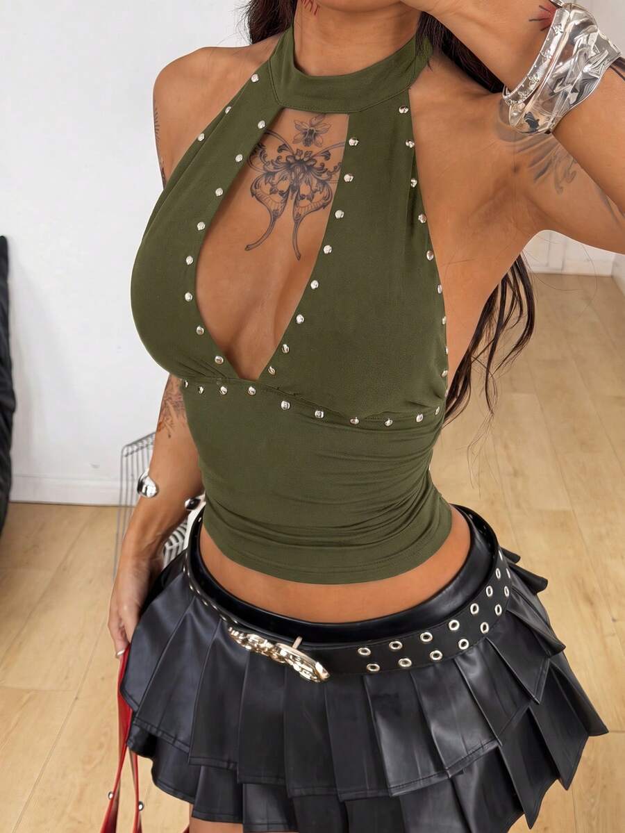 Women's metallic halter tank top featuring a plunging V-neck, slim fit cut, and backless tie-back design
