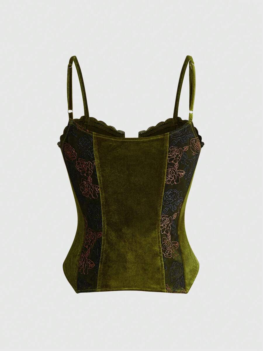 Green velvet crop top featuring lace-up front detailing, contrast lace cups, spaghetti straps, and detachable arm sleeves.