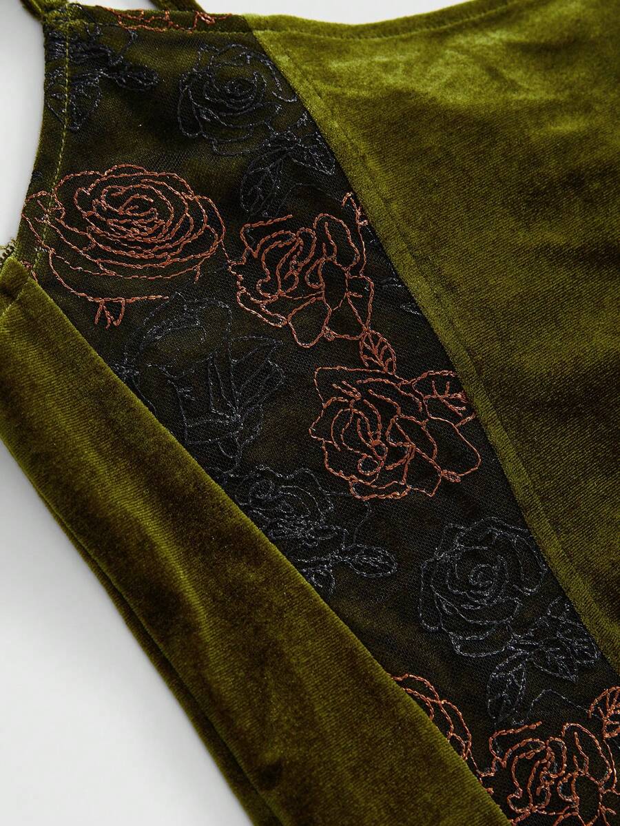 Green velvet crop top featuring lace-up front detailing, contrast lace cups, spaghetti straps, and detachable arm sleeves.