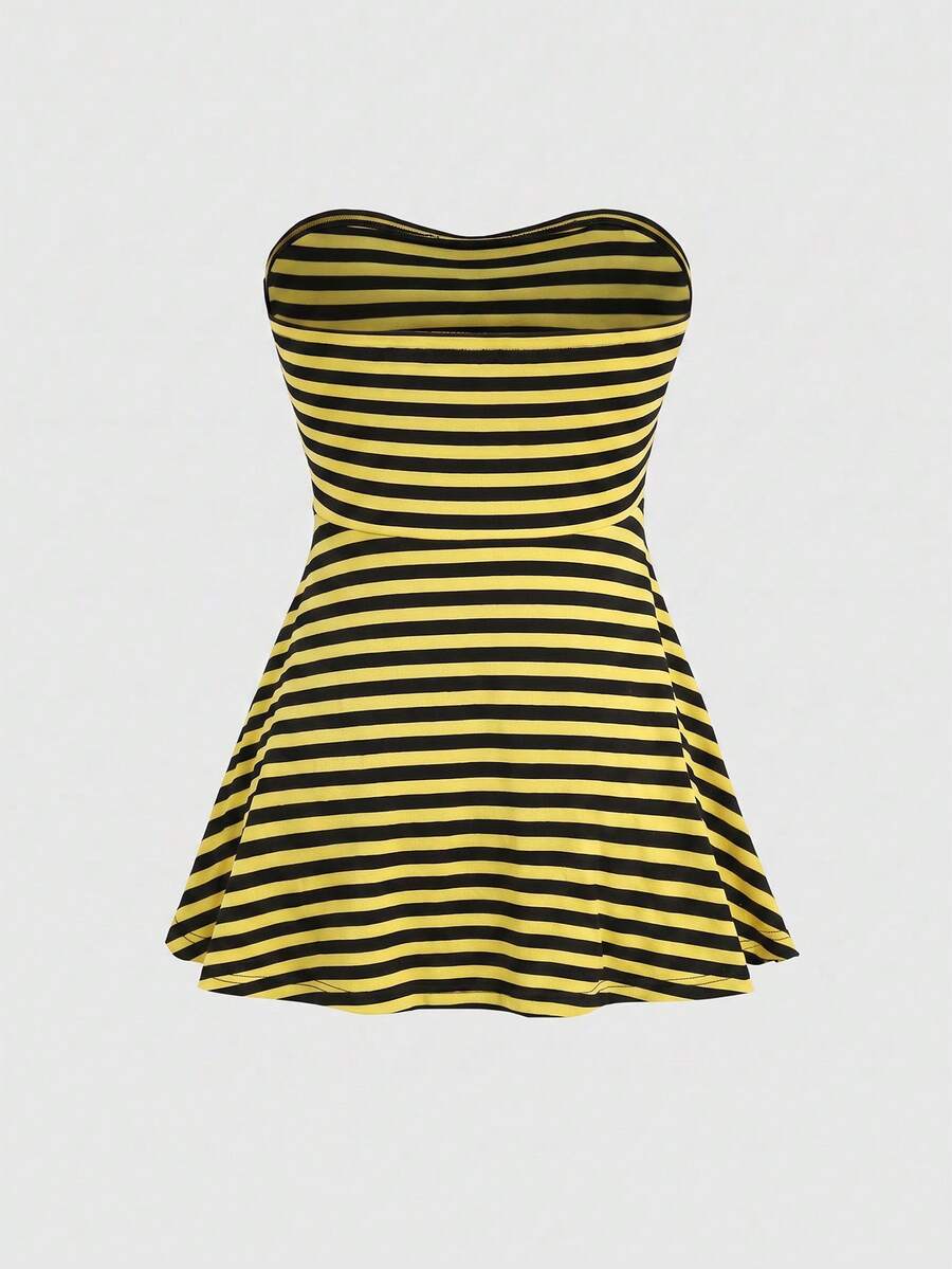 Women's striped strapless tube top featuring ruched detailing, flared hem, and stretchy knit fabric.