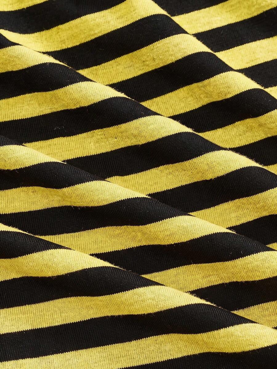Women's striped strapless tube top featuring ruched detailing, flared hem, and stretchy knit fabric.