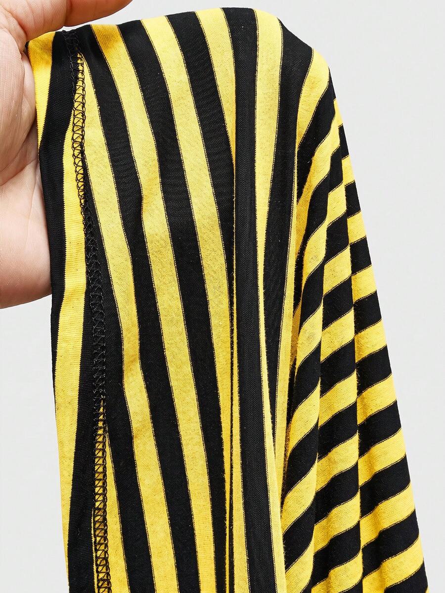 Women's striped strapless tube top featuring ruched detailing, flared hem, and stretchy knit fabric.