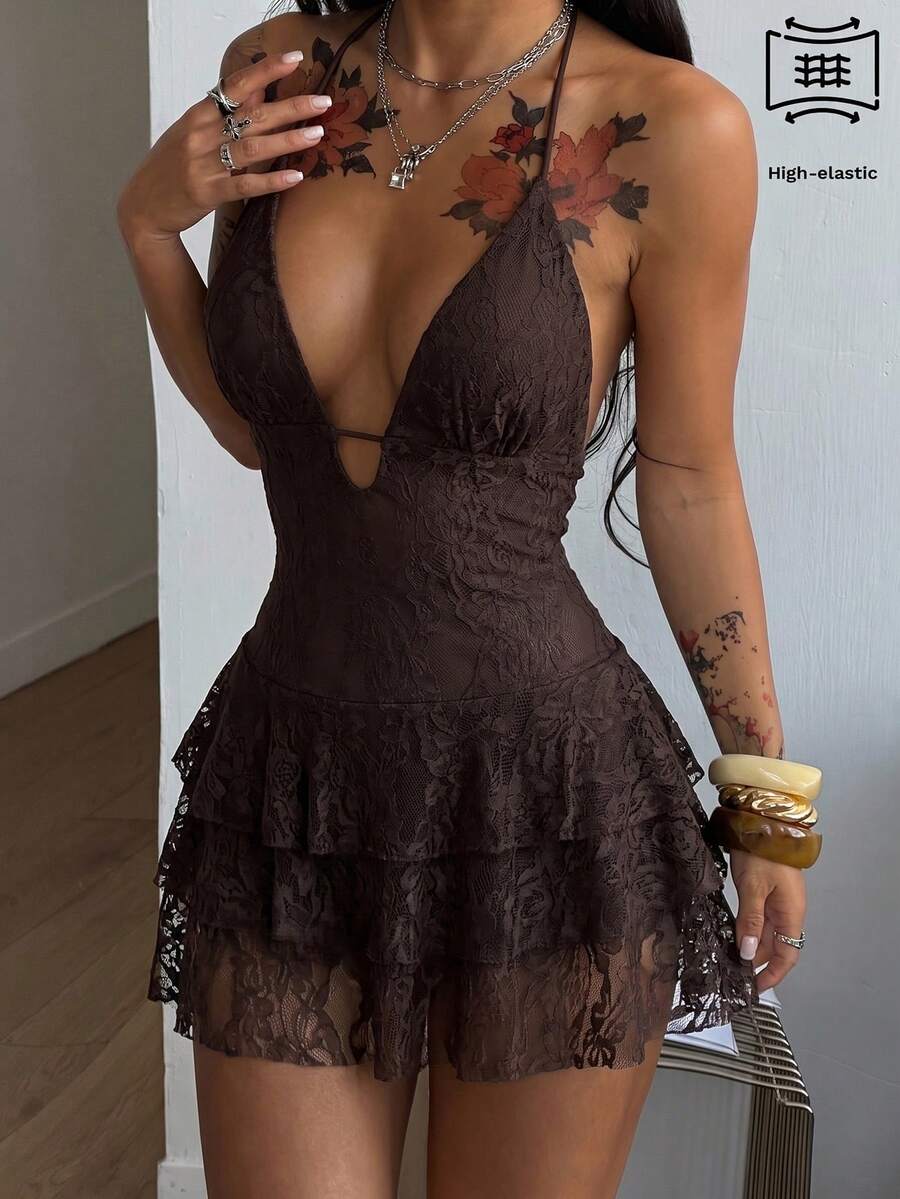 Front view of a women's lace halter mini dress featuring a slim-fit bodice, flared hem, and sleeveless design.
