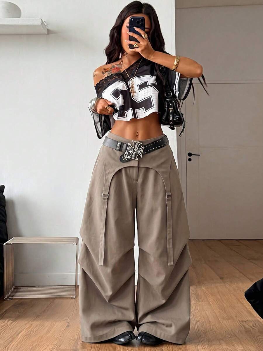 Women's loose fit wide leg utility parachute pants with functional pockets and low waist design