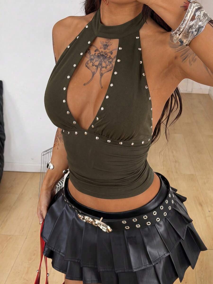 Women's metallic halter tank top featuring a plunging V-neck, slim fit cut, and backless tie-back design
