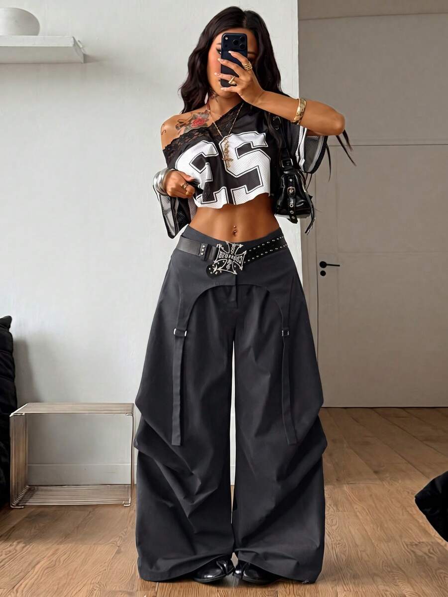 Women's loose fit wide leg utility parachute pants with functional pockets and low waist design