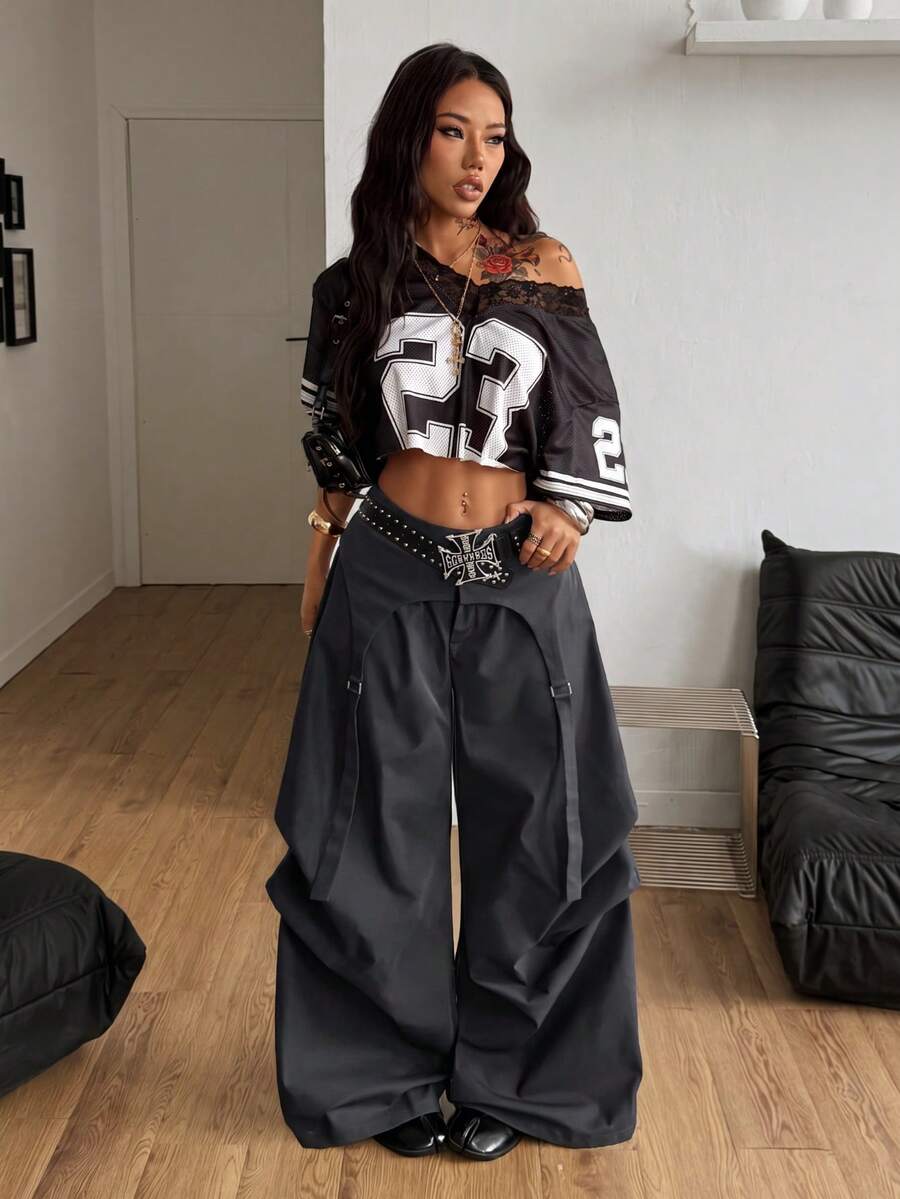 Women's loose fit wide leg utility parachute pants with functional pockets and low waist design