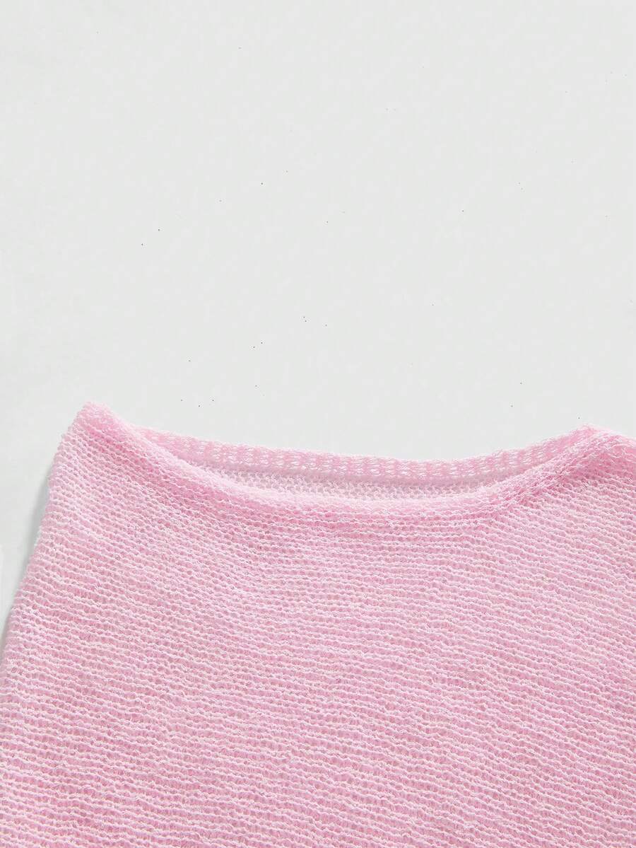 Women's casual hollow knit poncho top with boat neck, cloak sleeves, and asymmetrical hem