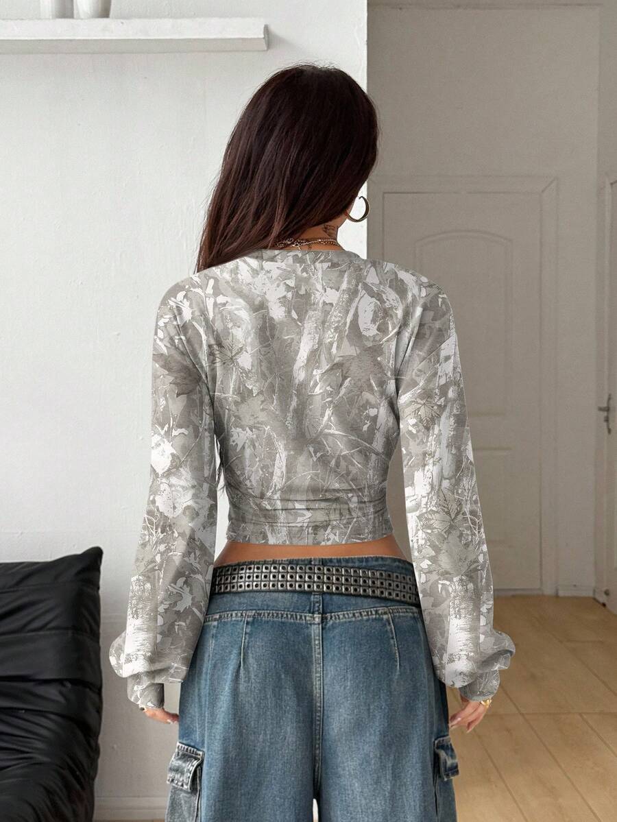 Women's brown waist-cinching sweatshirt featuring a round neck, drop shoulder long sleeves, and rib-knit cuffs.