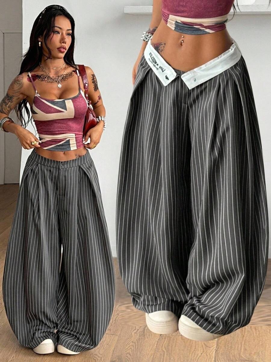 Women's loose fit dark grey harem pants featuring an elastic low waist, side pockets, and a wide leg casual streetwear cut.