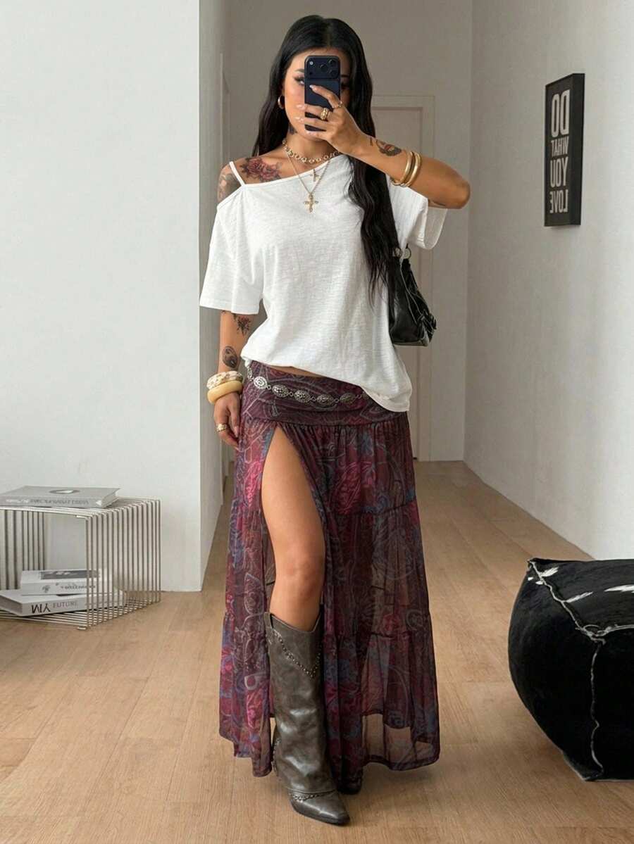 Women's floral split thigh long skirt in textured mesh fabric with a flared silhouette and low waist.