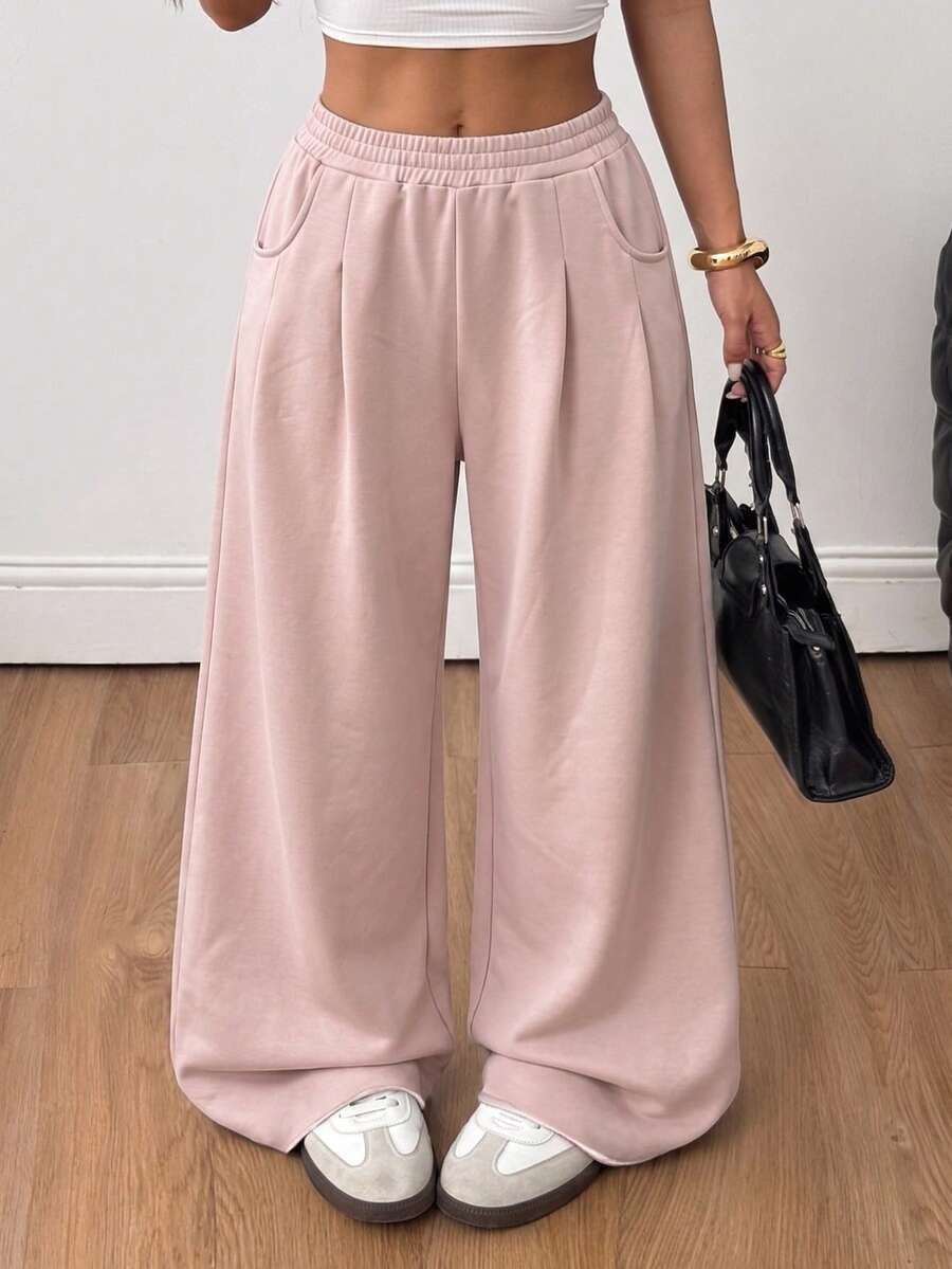 Women's loose wide leg casual sweatpants with an elastic waistband and side pockets