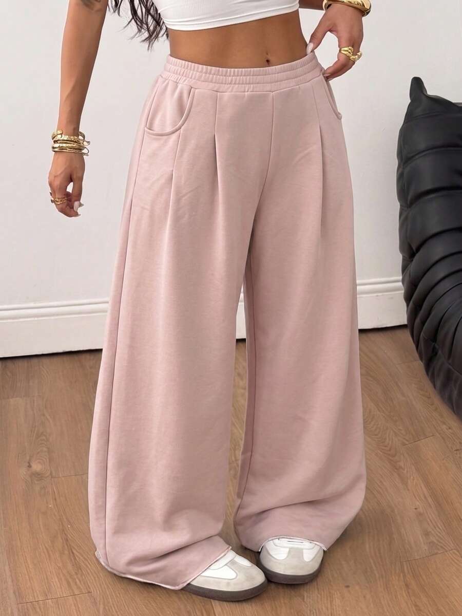 Women's loose wide leg casual sweatpants with an elastic waistband and side pockets