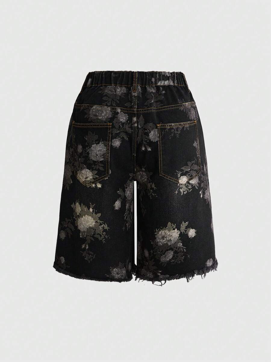 Women's loose wide-leg denim Bermuda shorts featuring vintage animal and paisley print with pockets and zipper fly.