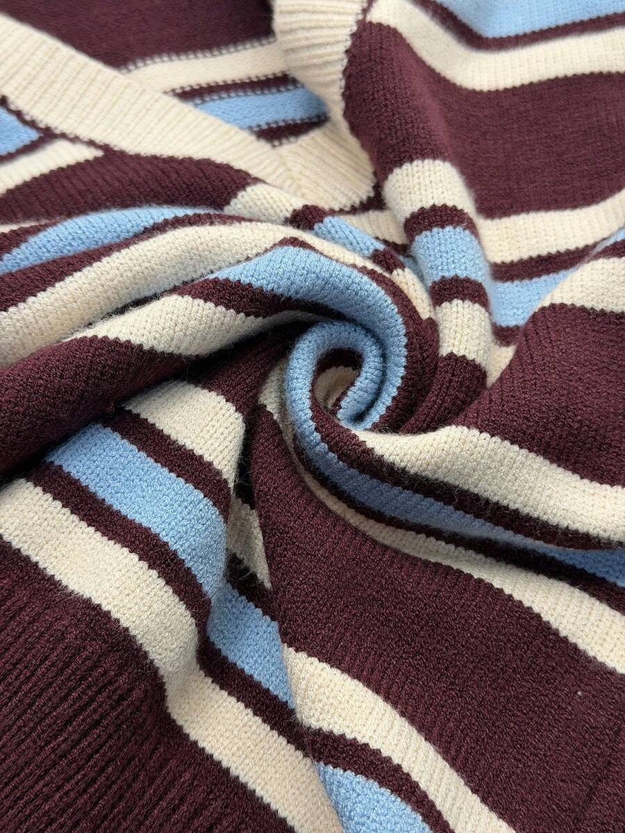 Women's striped long sleeve V-neck cable-knit pullover sweater with ribbed trim.